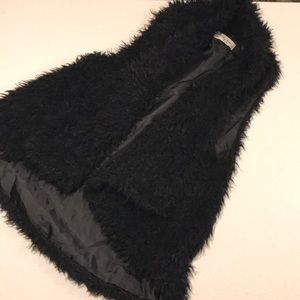 Black faux fur vest